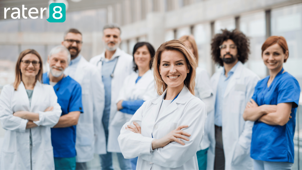 A group of doctors looking at the camera and smiling