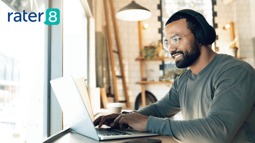 Picture of a happy remote employee working on a laptop