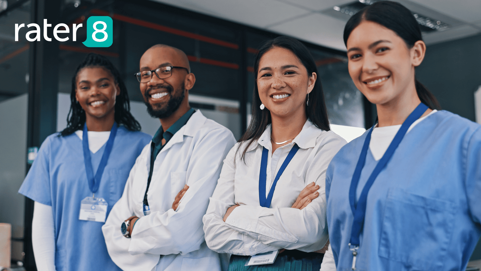 Four healthcare workers standing together